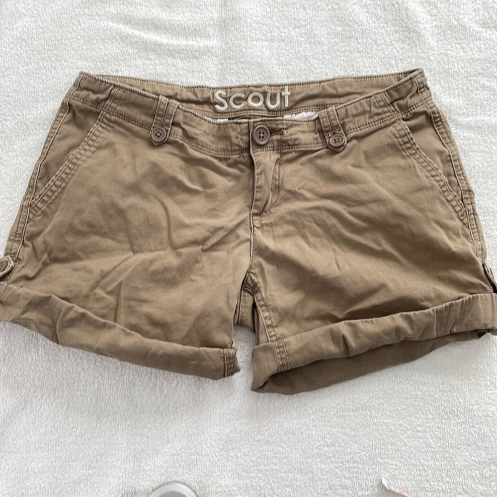 Khaki shorts with roll up pant leg strap and button by Delia’s size 0